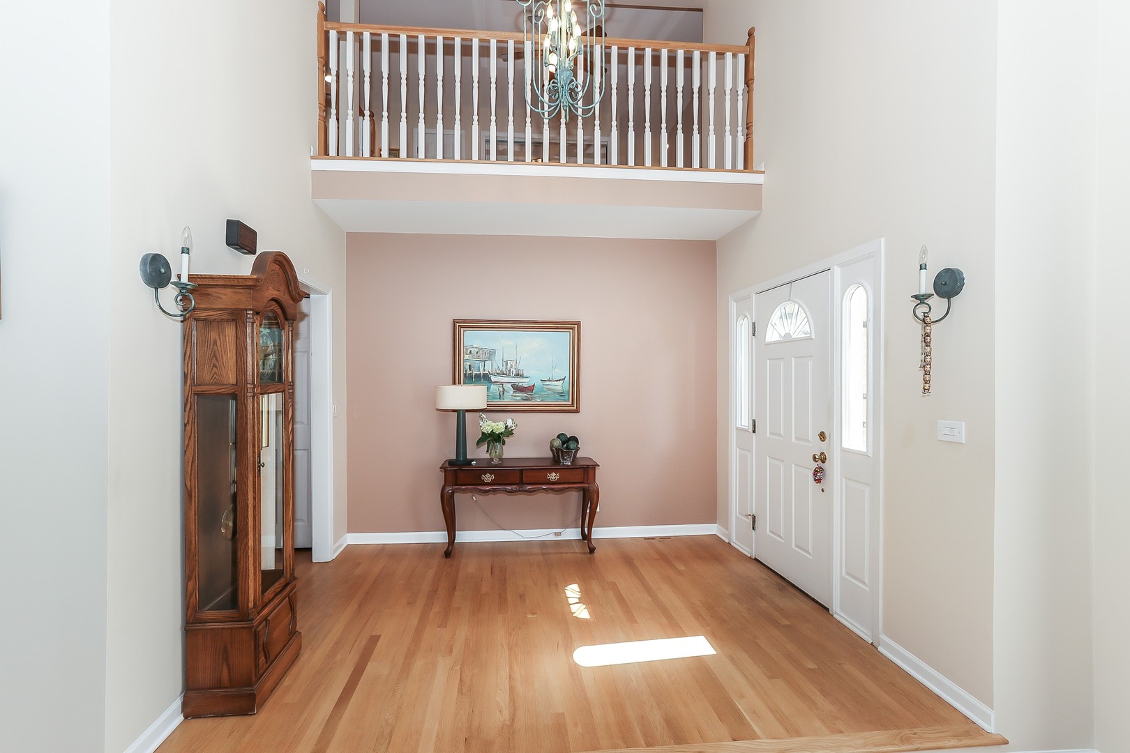 207 Ela Road Inverness, IL 60067 - Photo 2 of 30 a view of a hallway with wooden floor and a dining room
