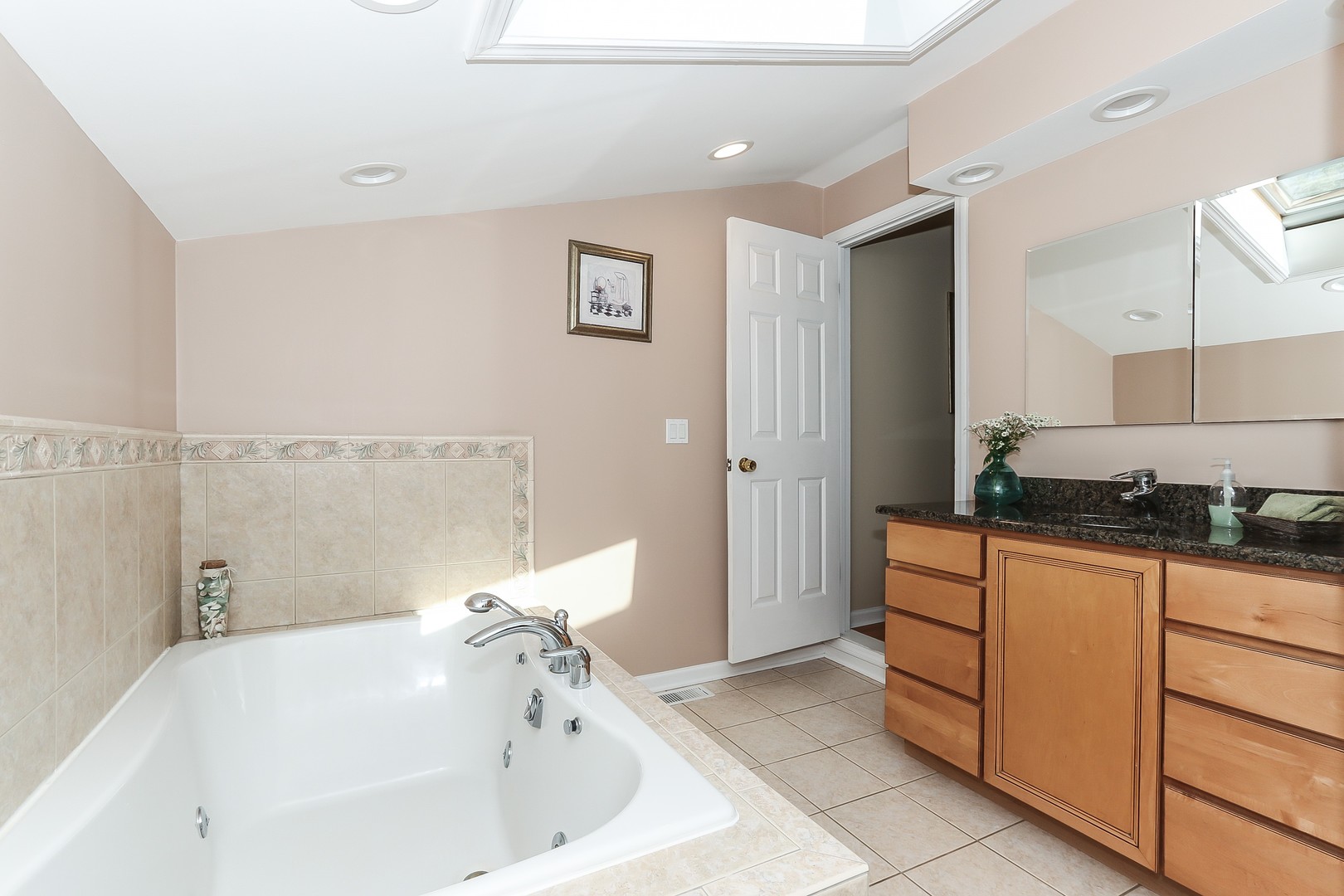 207 Ela Road Inverness, IL 60067 - Photo 17 of 30 a bathroom with a bathtub and a sink