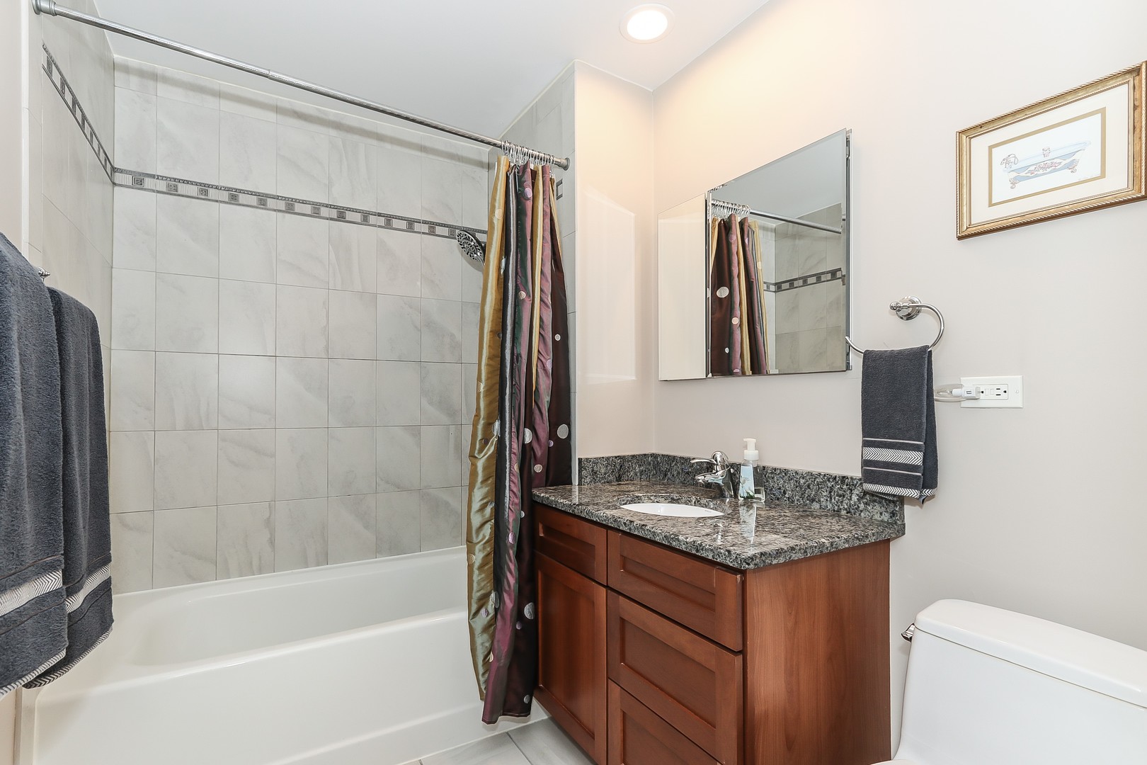 207 Ela Road Inverness, IL 60067 - Photo 21 of 30 a bathroom with a granite countertop sink and a mirror