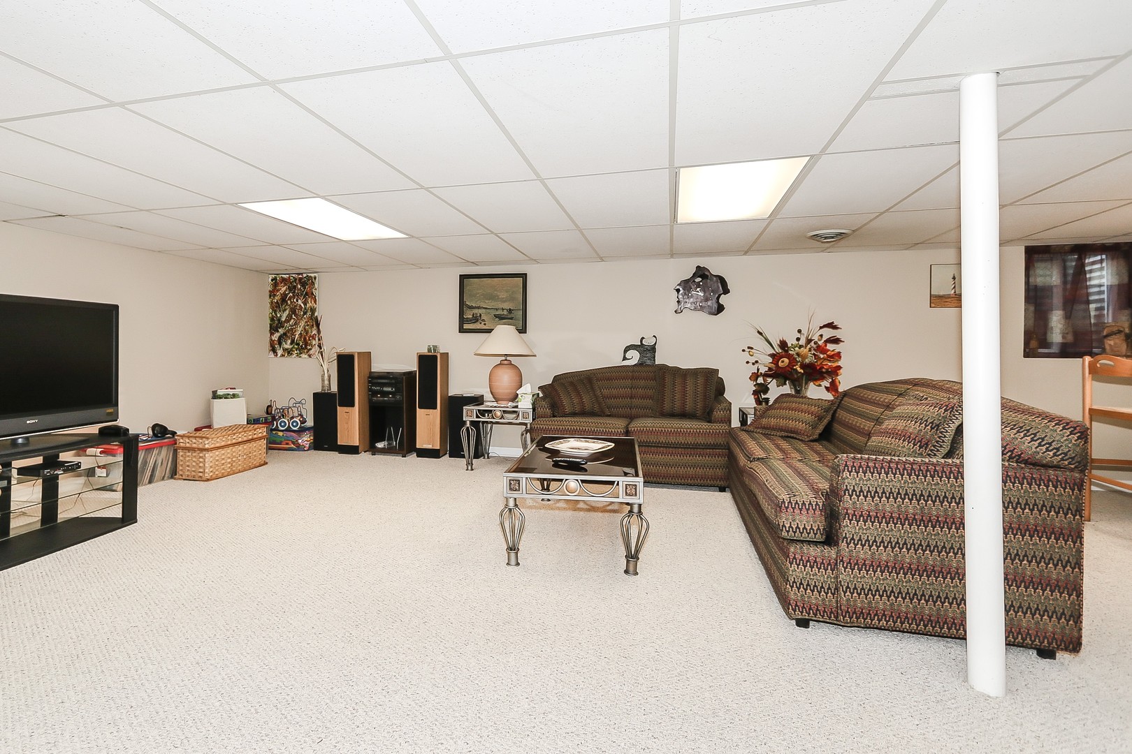 207 Ela Road Inverness, IL 60067 - Photo 24 of 30 a living room with furniture and a flat screen tv