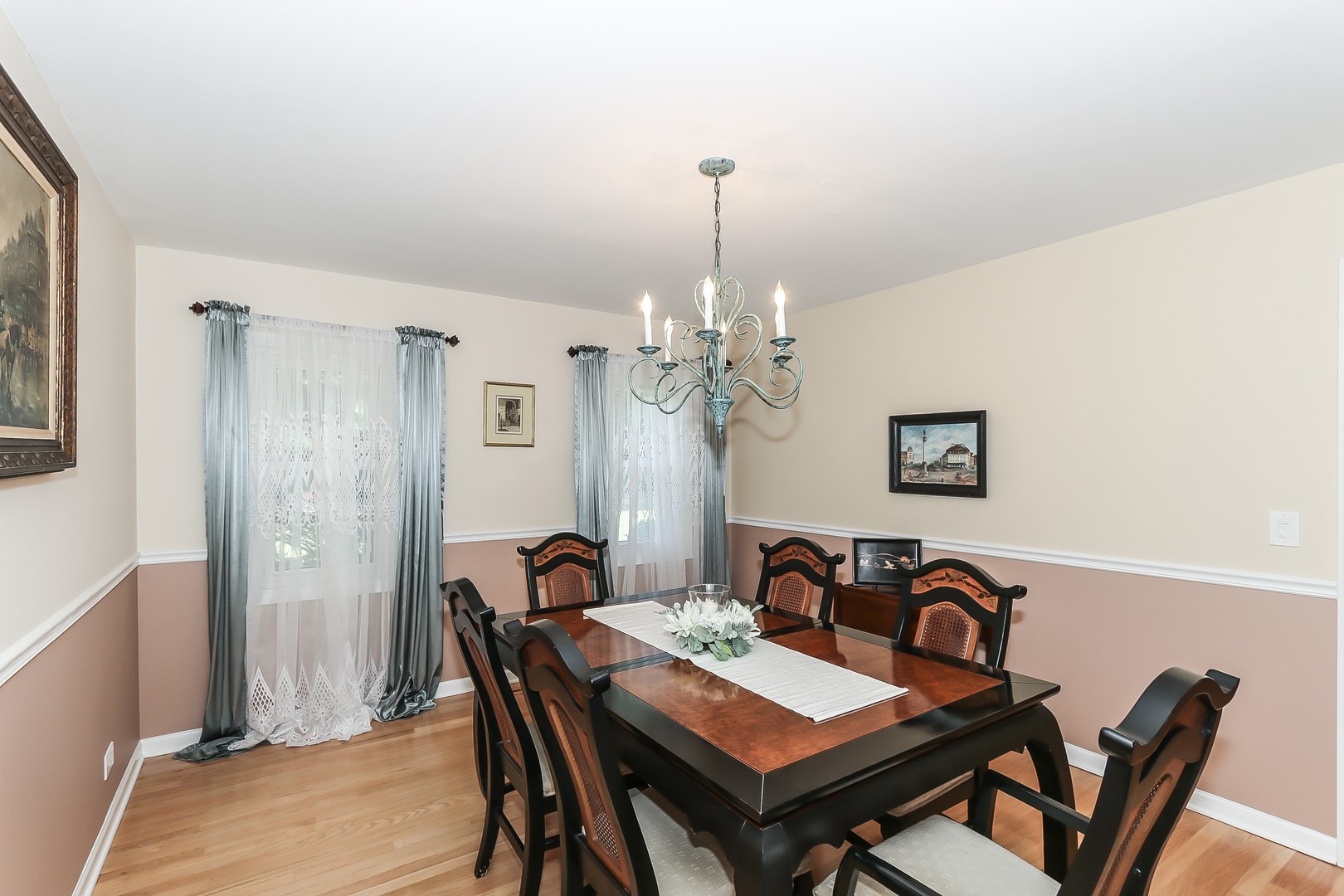 207 Ela Road Inverness, IL 60067 - Photo 5 of 30 a view of a dining room with furniture and a chandelier