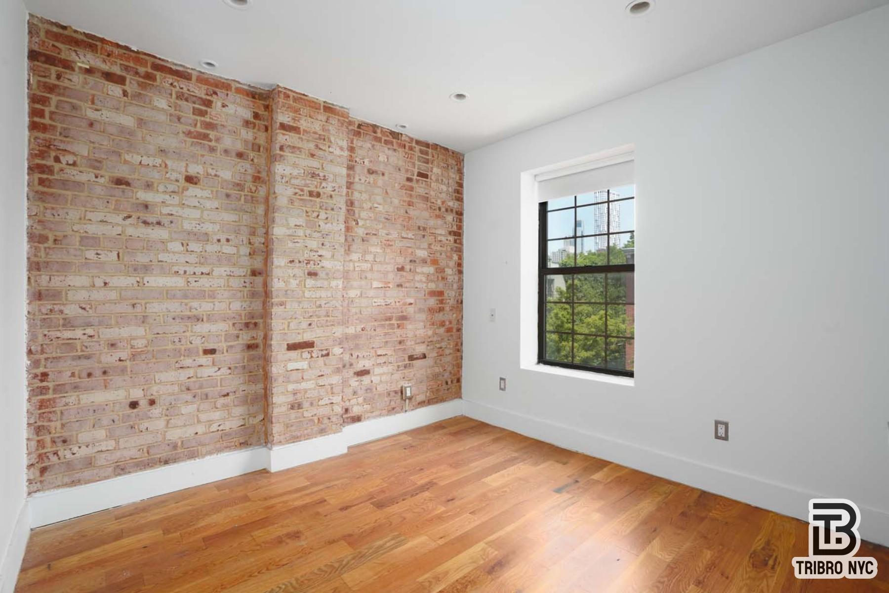 506 Warren Street, Unit 2F Brooklyn, NY 11217 - Photo 3 of 7 a view of an empty room and window