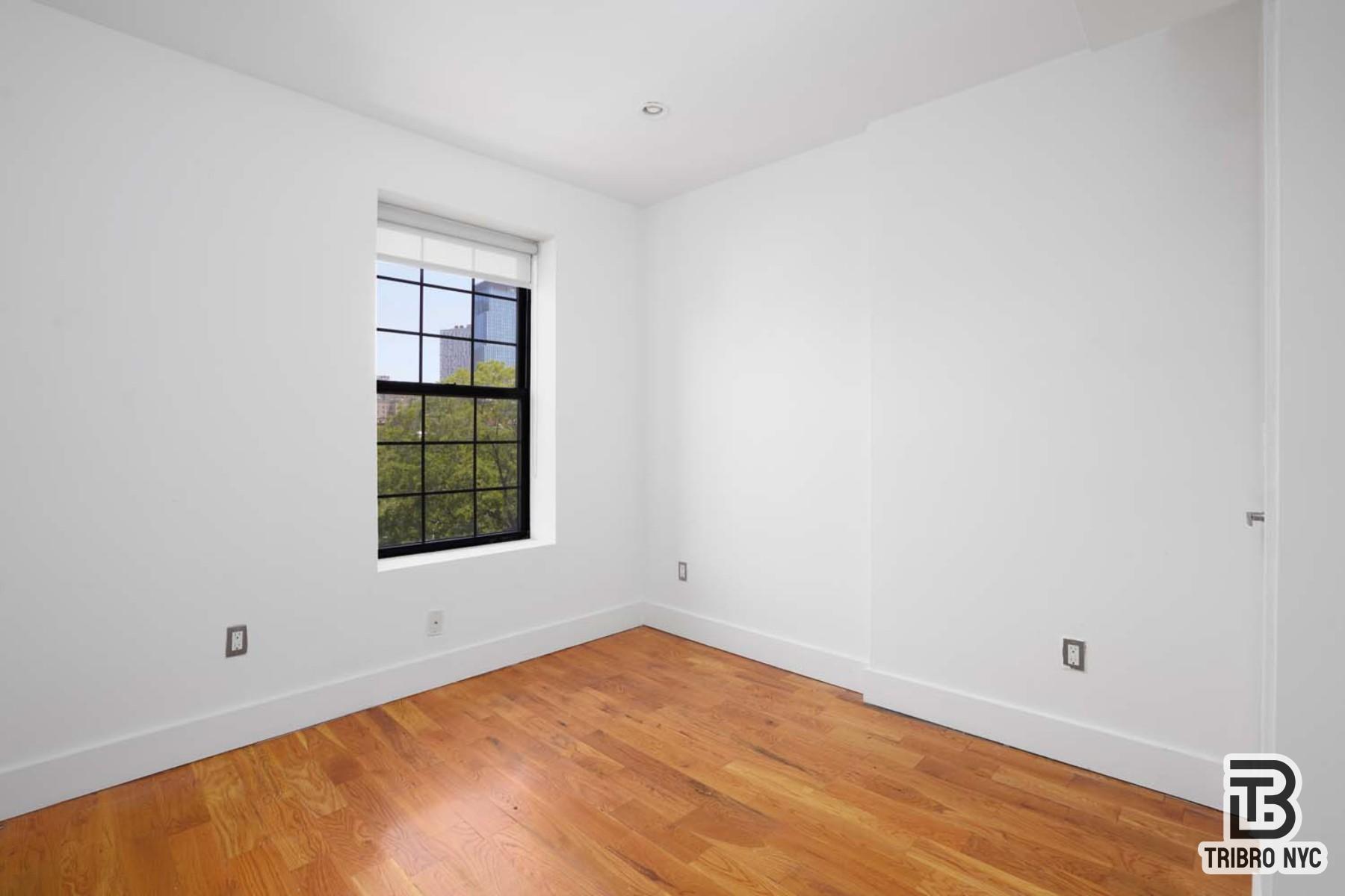 506 Warren Street, Unit 2F Brooklyn, NY 11217 - Photo 7 of 7 an empty room with a window