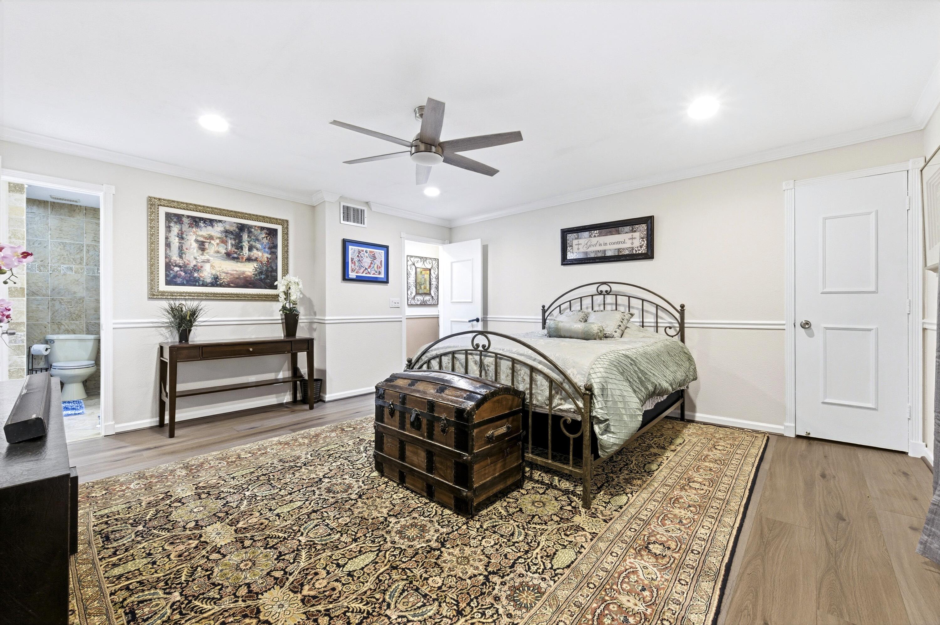 1945 Northwest 4th Avenue, Unit 43C Boca Raton, FL 33432 - Photo 19 of 23 a bedroom with a bed and a walk in closet