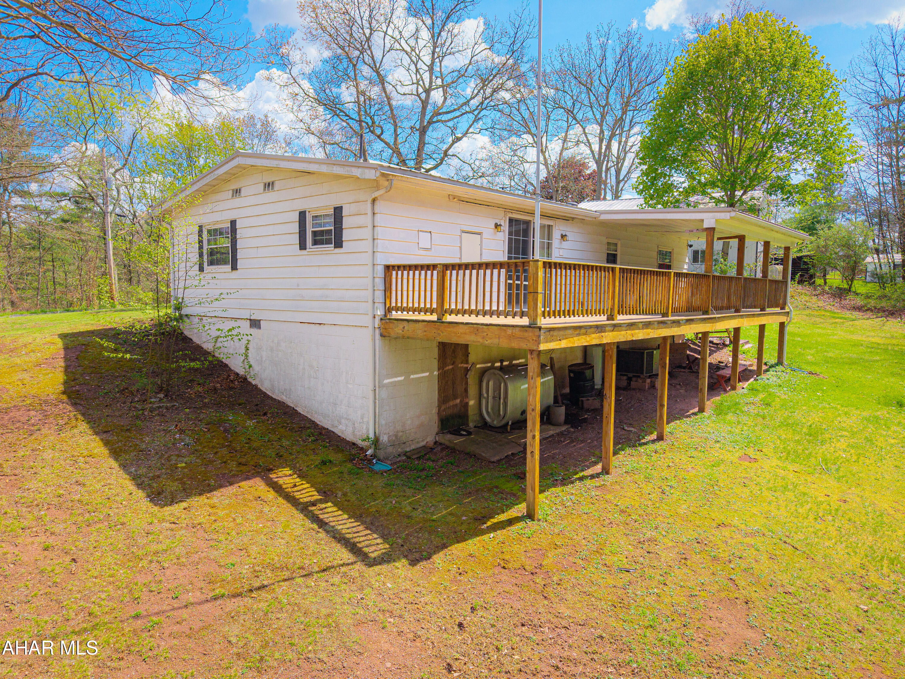 151 Pine Echo Road Everett, PA 15537 - Photo 9 of 51 a view of a house with a backyard
