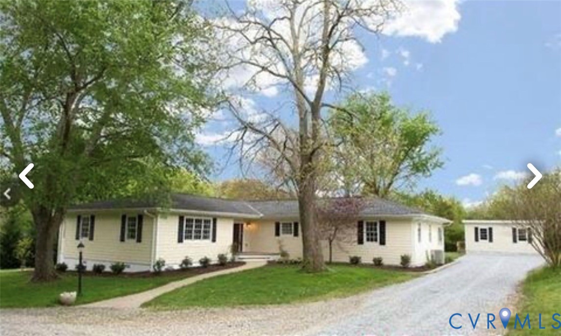 12301 Kain Road Glen Allen, VA 23059 - Photo 3 of 3 a front view of a house with a garden
