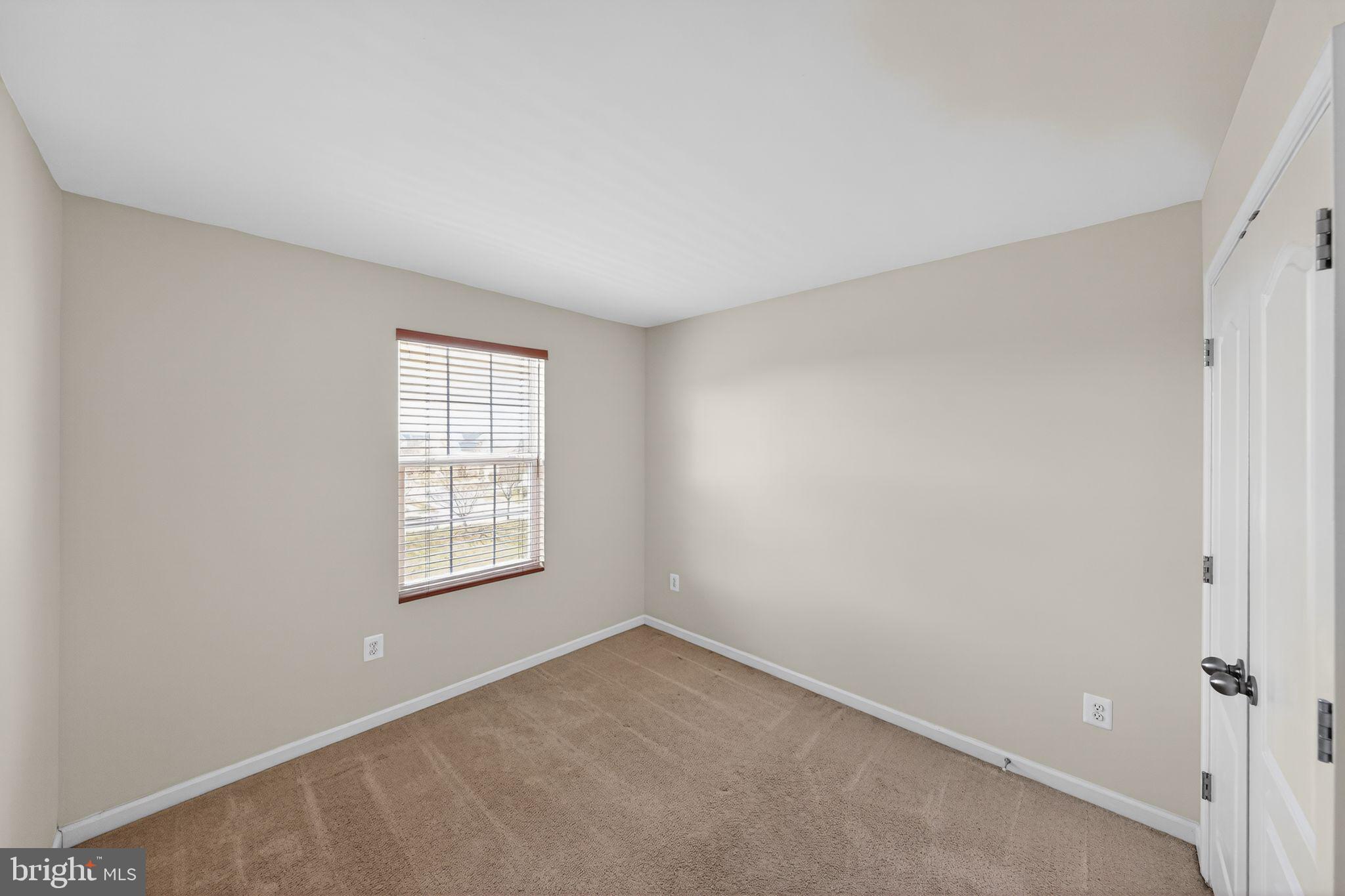 11831 Sunset Ridge Place Waldorf, MD 20602 - Photo 19 of 24 an empty room with windows