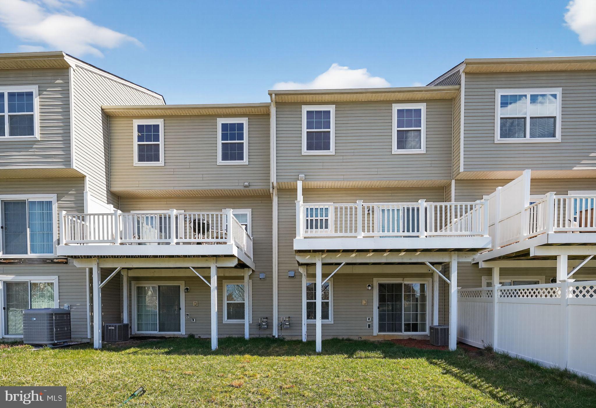 11831 Sunset Ridge Place Waldorf, MD 20602 - Photo 2 of 24 a front view of a house with a yard