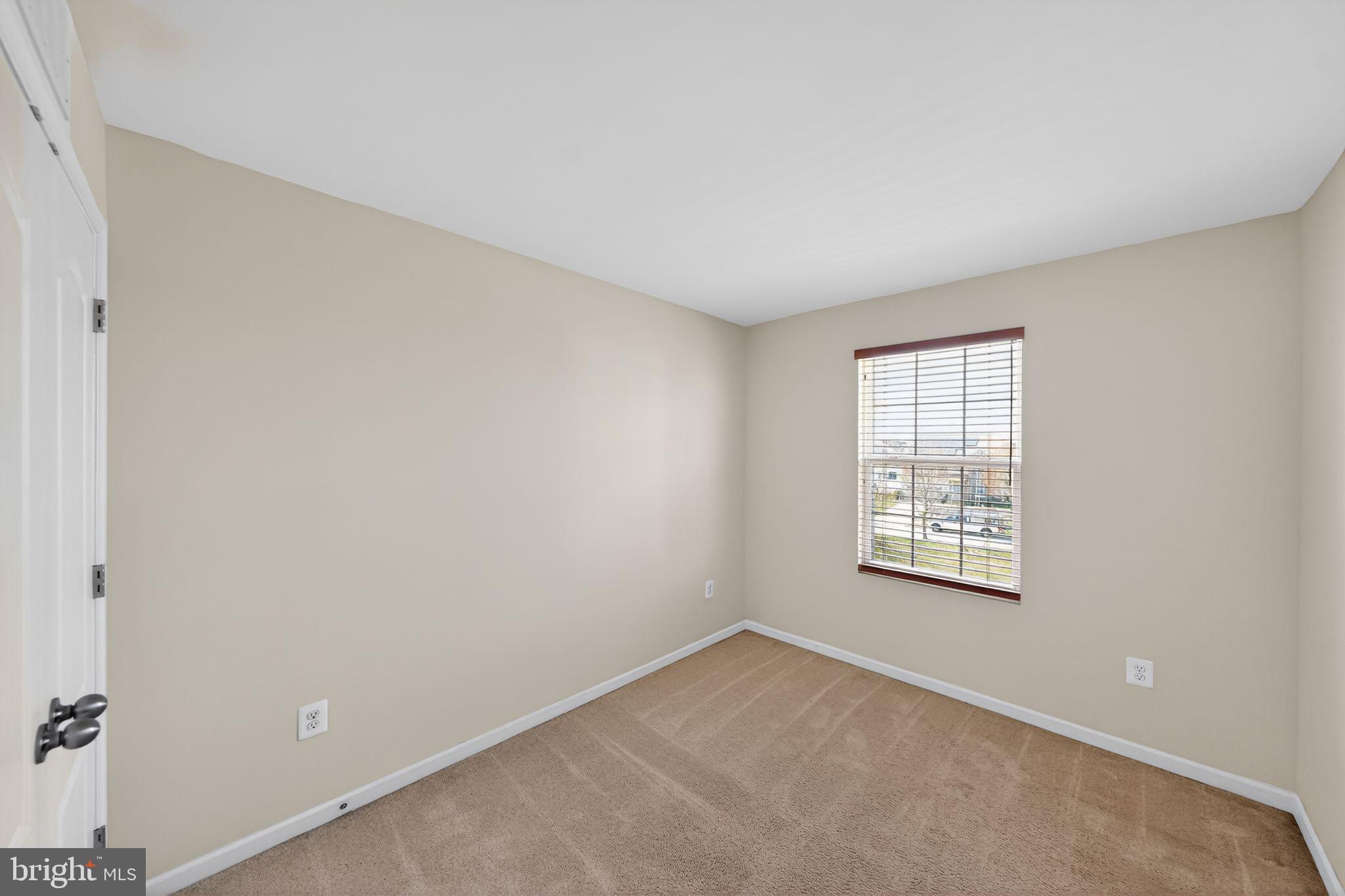 11831 Sunset Ridge Place Waldorf, MD 20602 - Photo 22 of 24 an empty room with windows