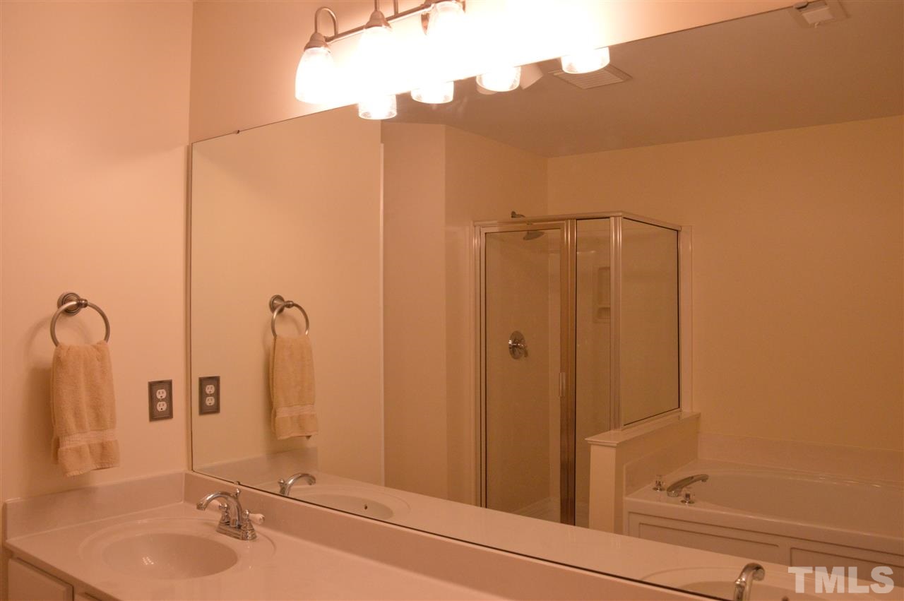 11164 Slider Drive Raleigh, NC 27614 - Photo 14 of 25 No ugly brass hardware here! Master bath features double vanity, separate tub and shower.