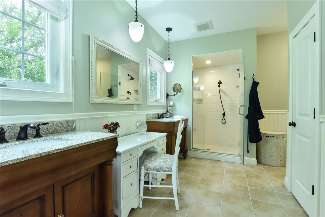 27 Preservation Drive Exeter, RI 02874 - Photo 21 of 41 Primary bathroom with large shower and double sinks