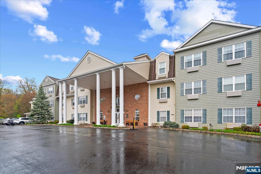 2 Richmond Road, Unit 306 West Milford, NJ 07480 - Photo 2 of 33 a view of a building with a street