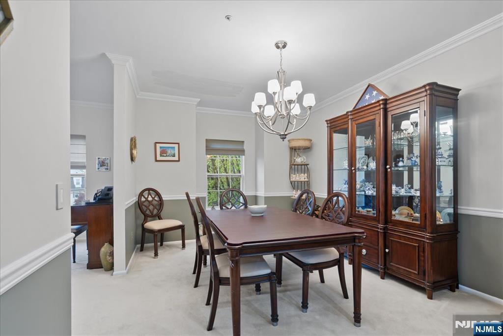2 Richmond Road, Unit 306 West Milford, NJ 07480 - Photo 29 of 33 a view of a dining room with furniture and window