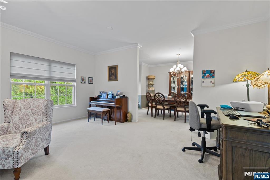 2 Richmond Road, Unit 306 West Milford, NJ 07480 - Photo 10 of 33 a living room with furniture and a large window