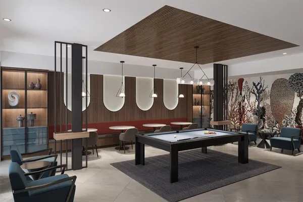 a kitchen with stainless steel appliances a microwave a sink a stove a refrigerator and white cabinets