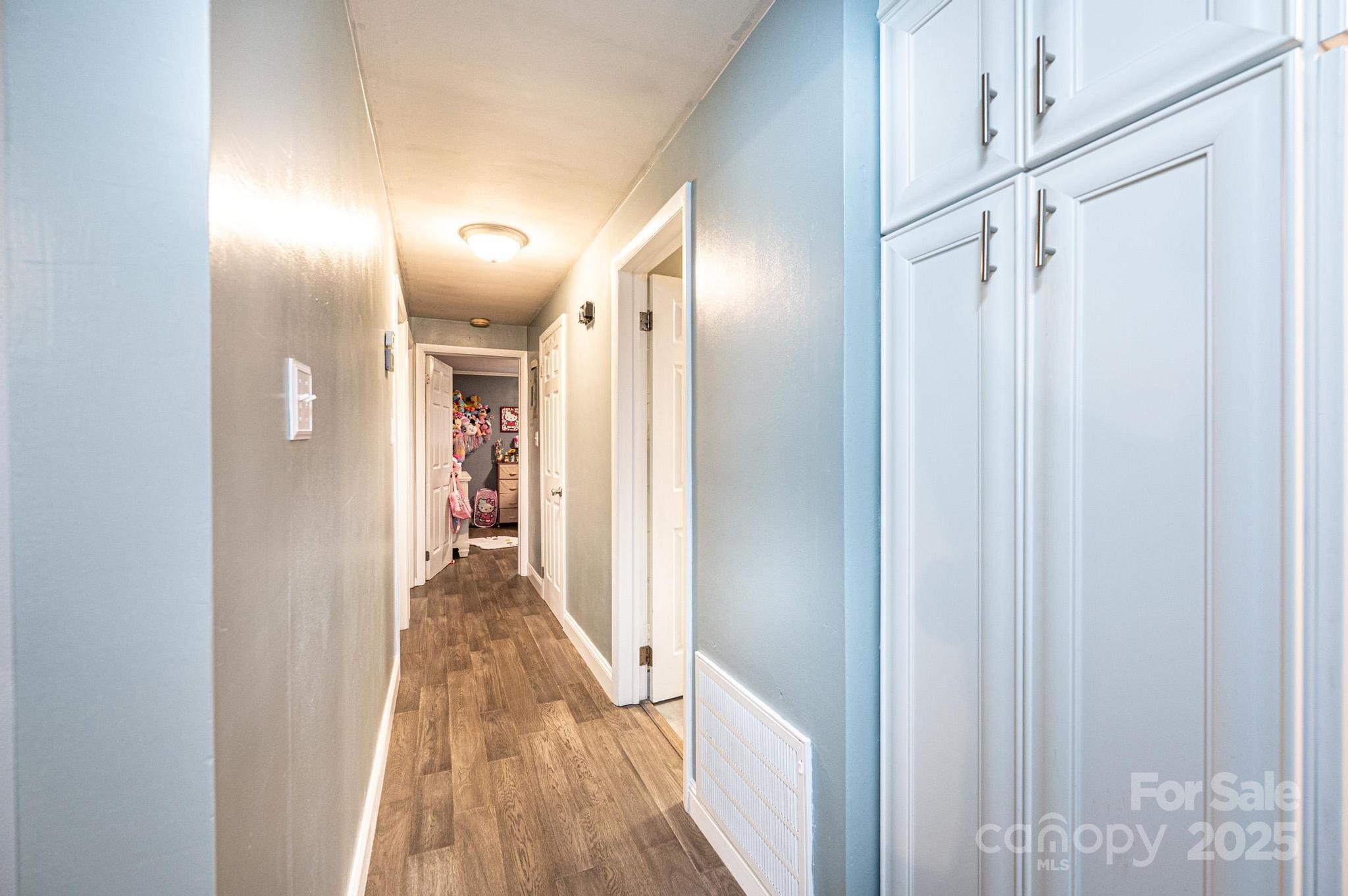 2841 21st Street Northeast Hickory, NC 28601 - Photo 19 of 43 a view of hallway with wooden floor