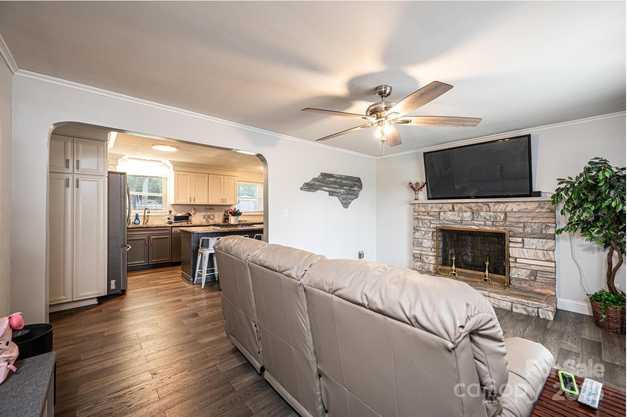 2841 21st Street Northeast Hickory, NC 28601 - Photo 2 of 43 a living room with furniture fireplace and flat screen tv