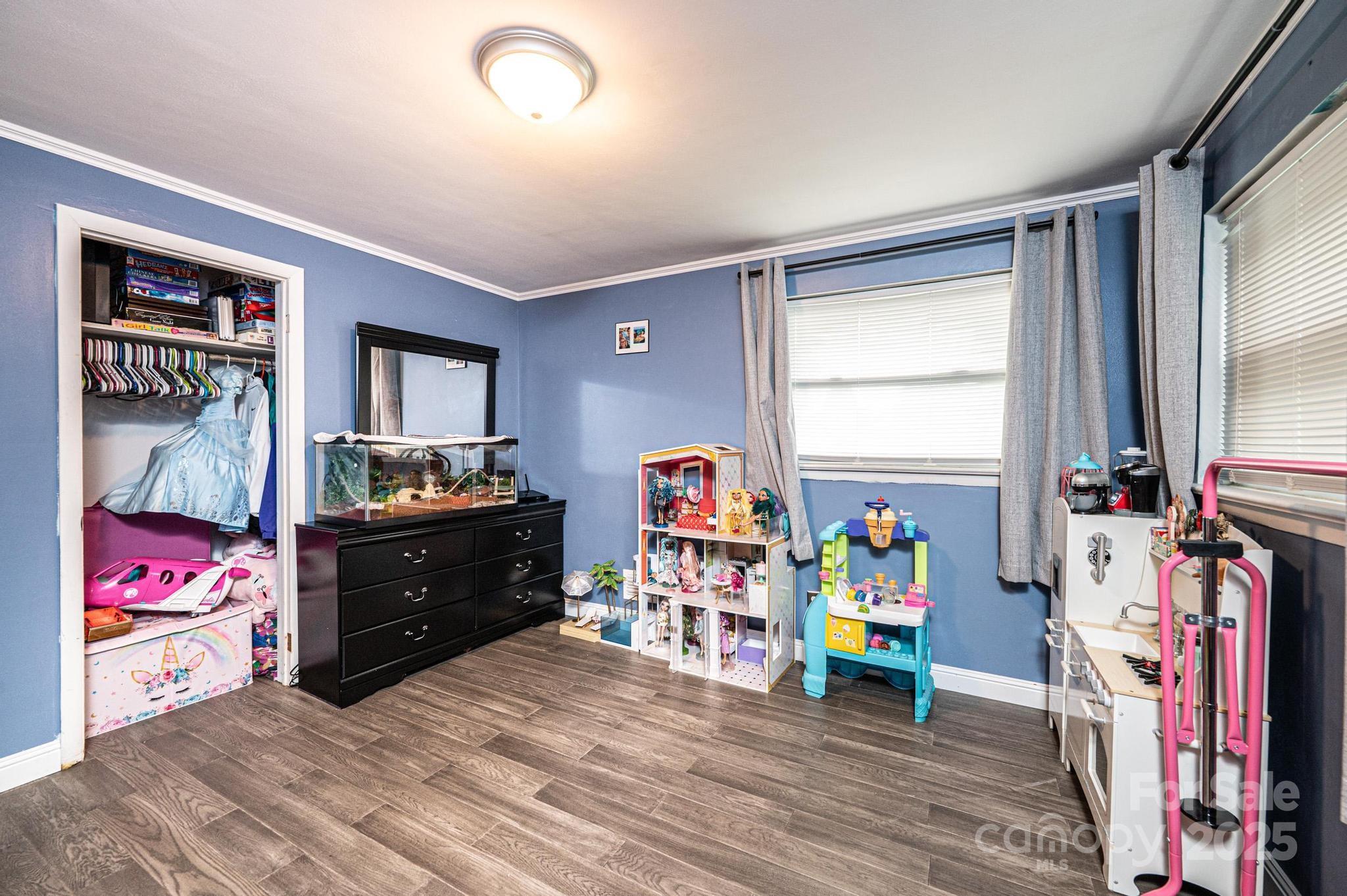2841 21st Street Northeast Hickory, NC 28601 - Photo 24 of 43 a bedroom with furniture and a window
