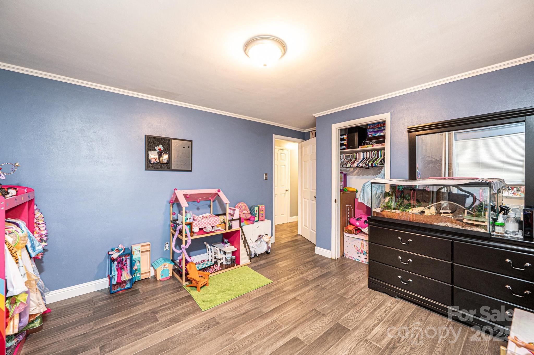 2841 21st Street Northeast Hickory, NC 28601 - Photo 25 of 43 a children room with toys and dresser
