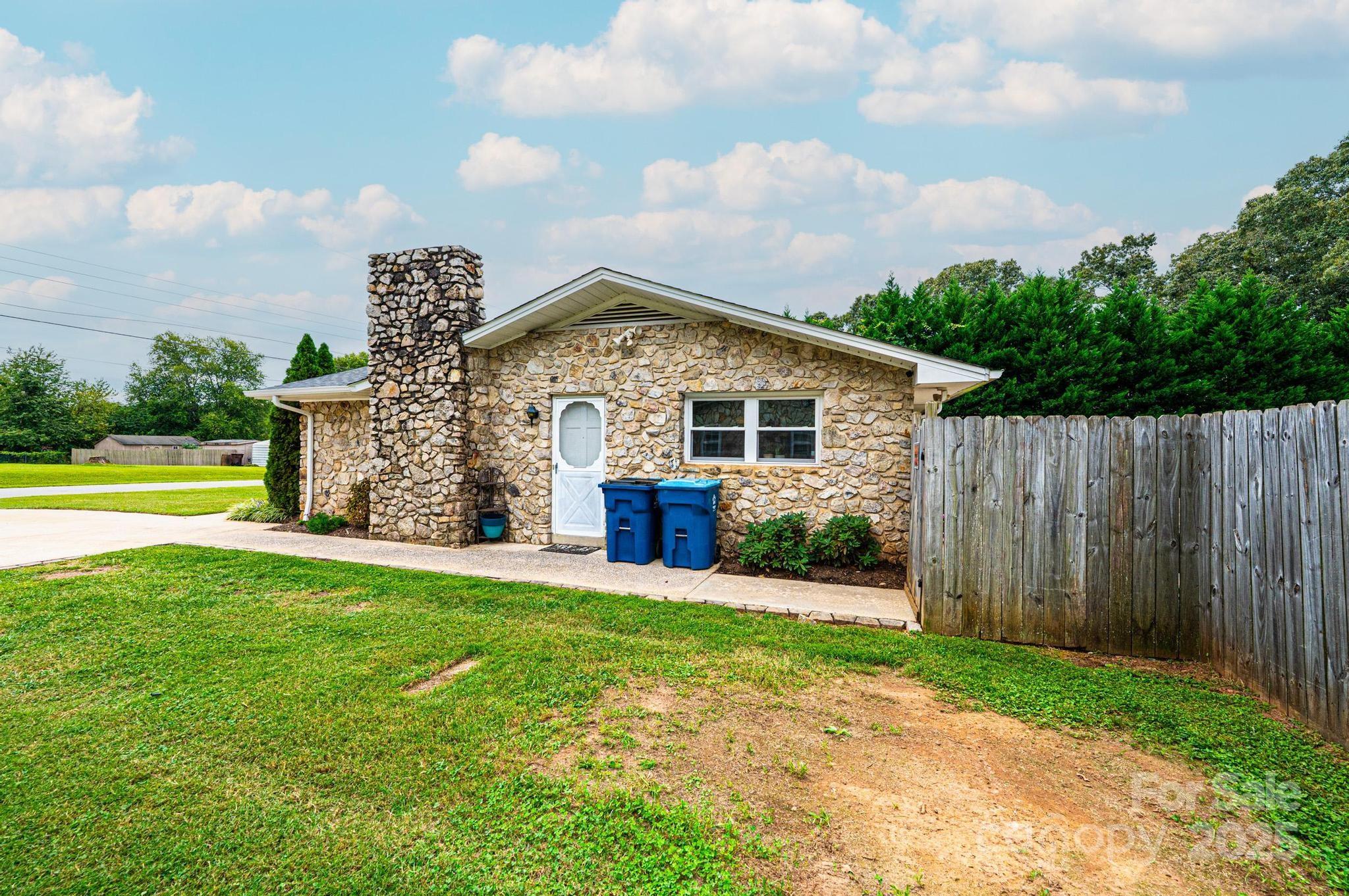 2841 21st Street Northeast Hickory, NC 28601 - Photo 35 of 43 a view of a house with a yard and sitting area