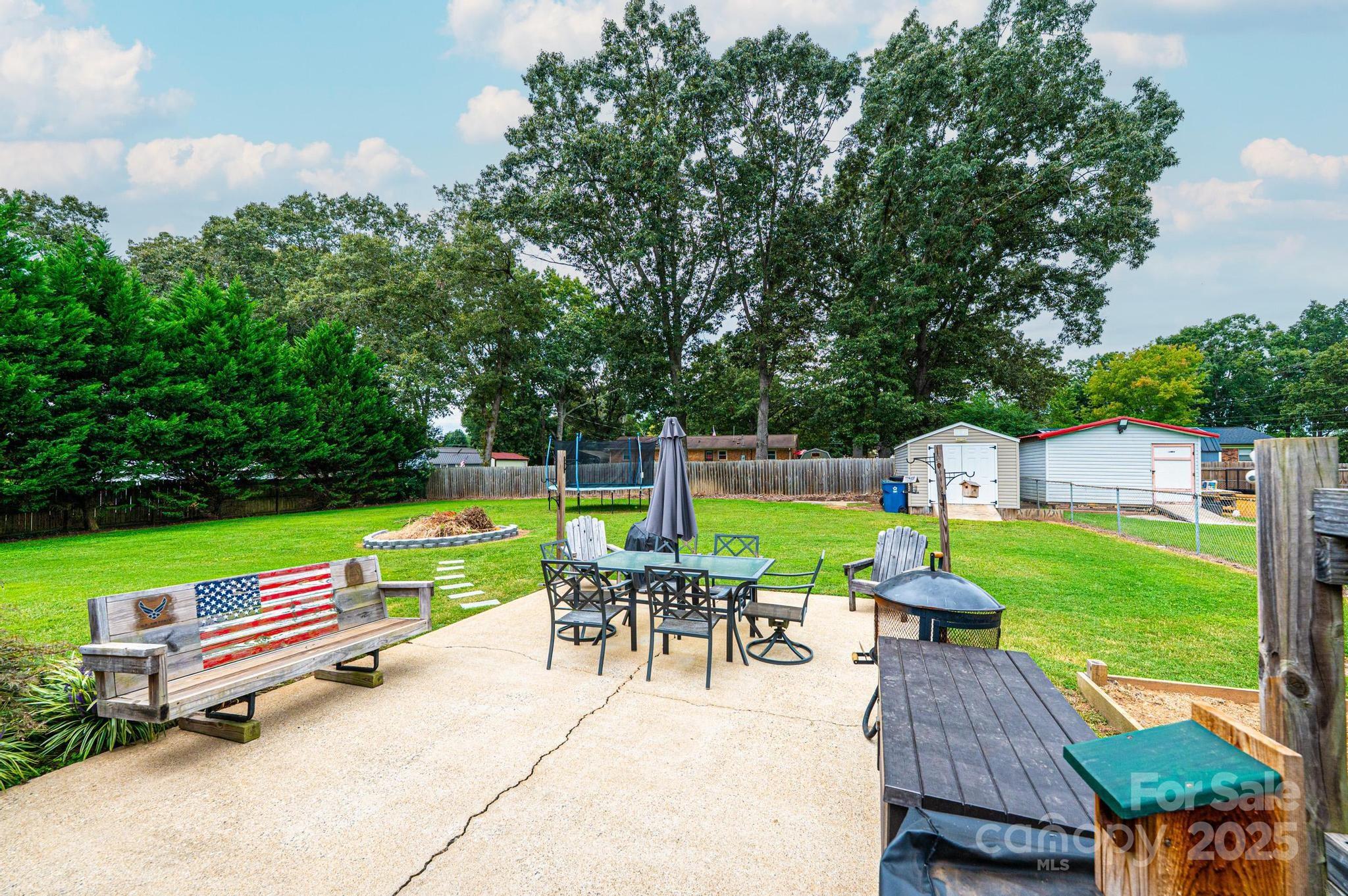 2841 21st Street Northeast Hickory, NC 28601 - Photo 36 of 43 a view of backyard with seating area and green space