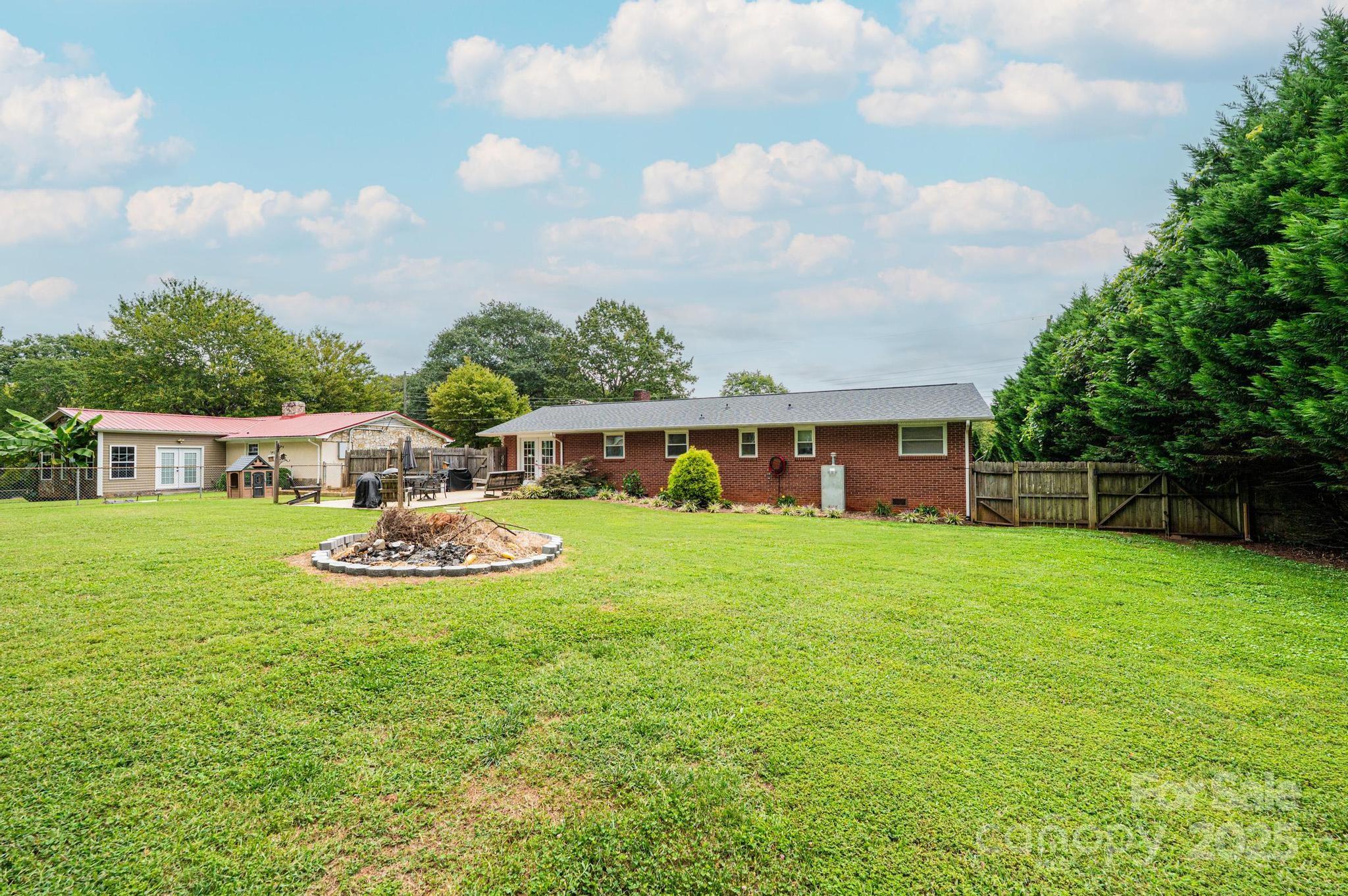 2841 21st Street Northeast Hickory, NC 28601 - Photo 41 of 43 a view of house with backyard and outdoor seating