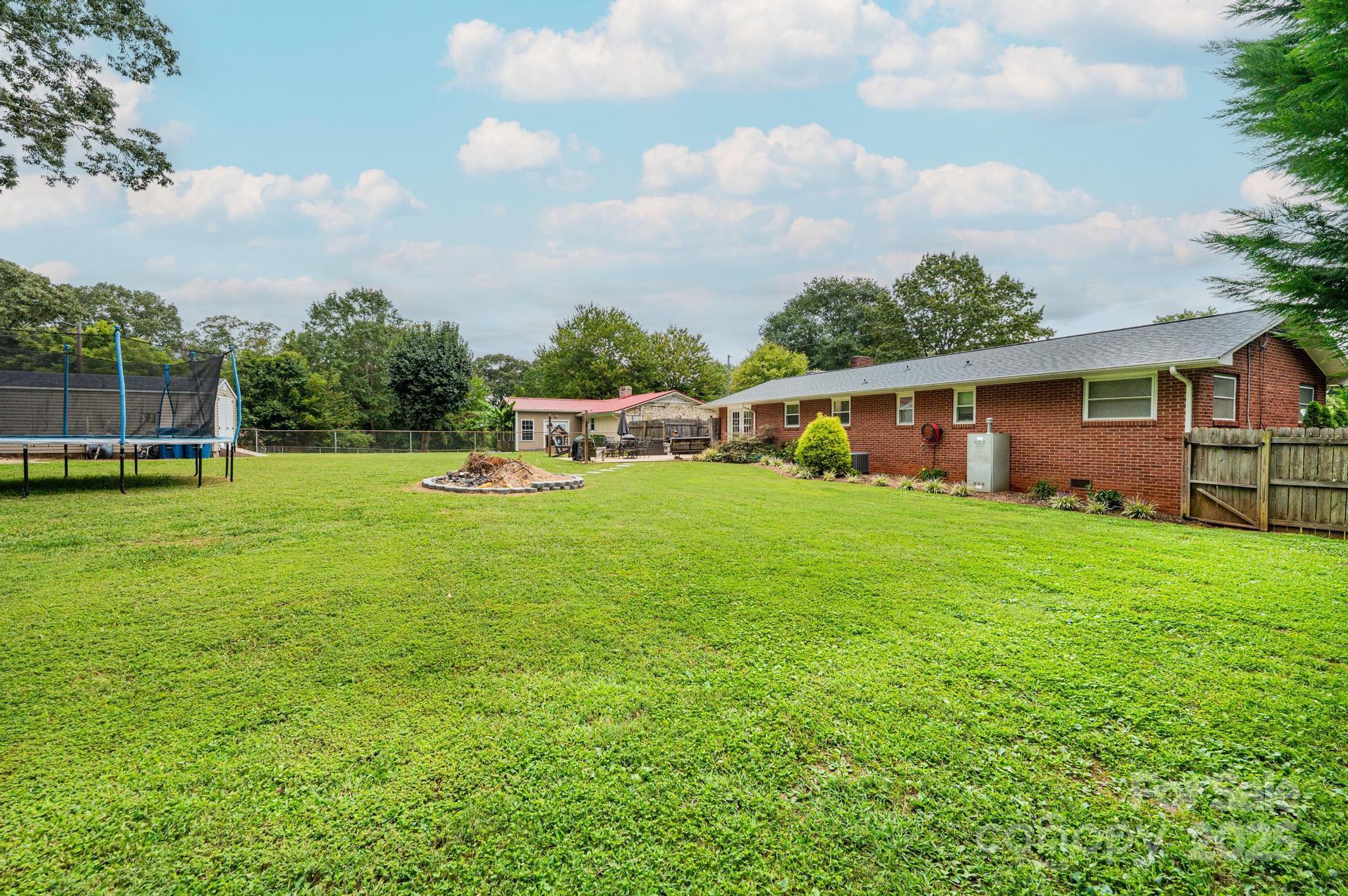 2841 21st Street Northeast Hickory, NC 28601 - Photo 42 of 43 a view of house with backyard and garden