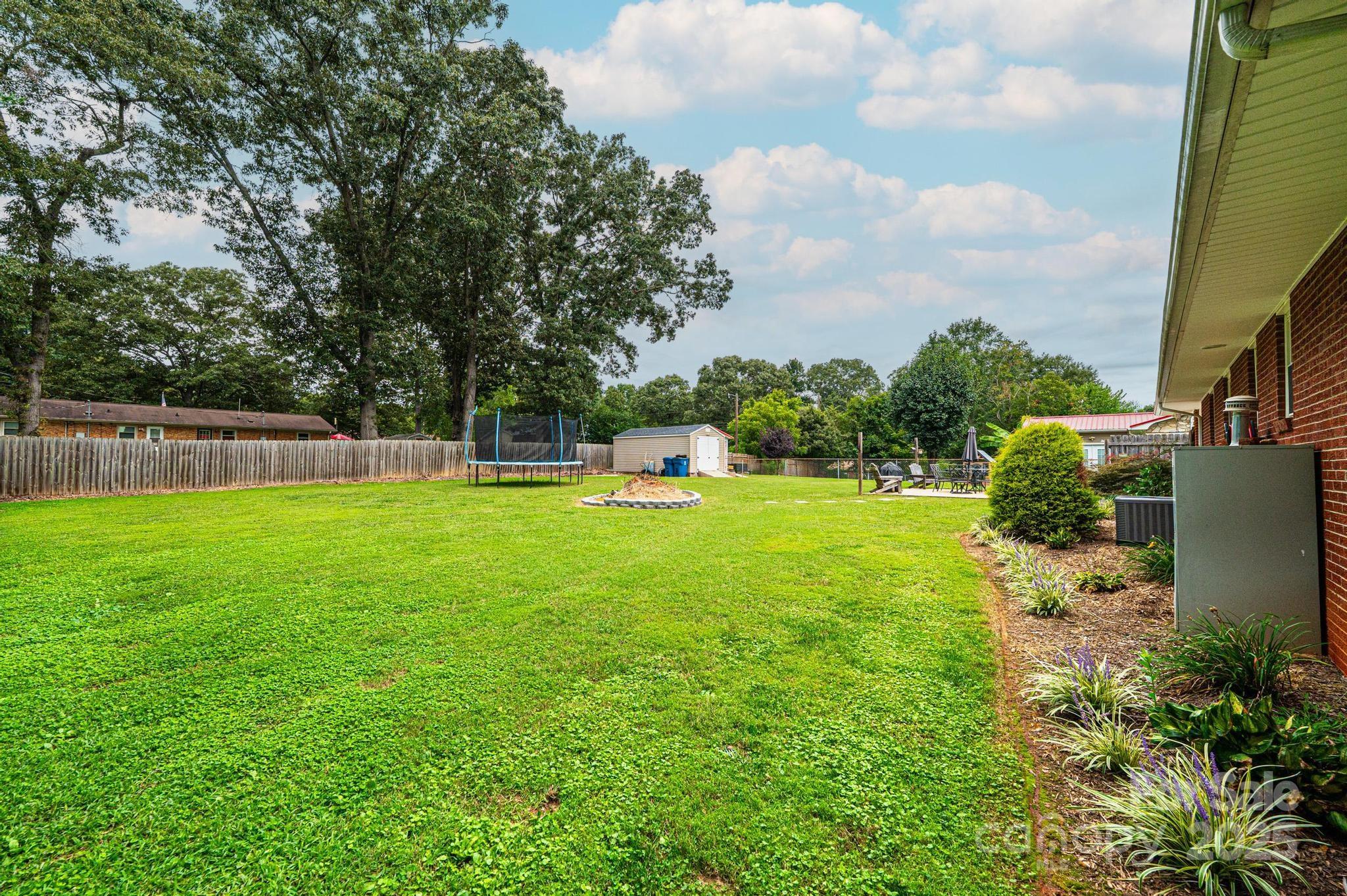 2841 21st Street Northeast Hickory, NC 28601 - Photo 43 of 43 a view of yard with swimming pool and green space