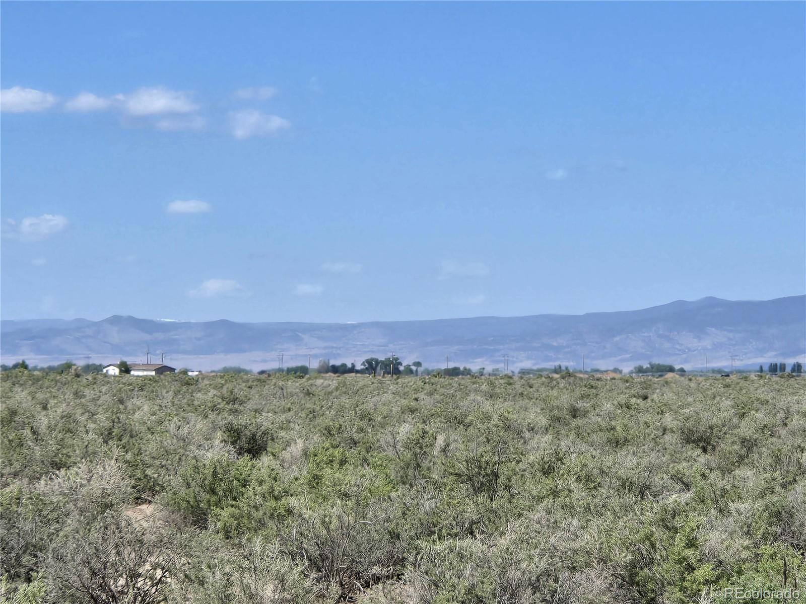 40 Acres Tbd Mosca, CO 81146 - Photo 8 of 13 a view of a lush green field