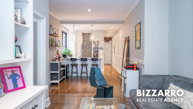 a kitchen with a table and chairs