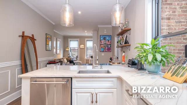 a view of living room and kitchen