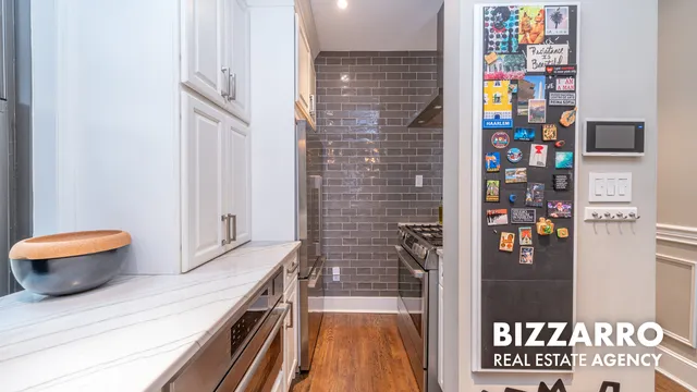 a bathroom with a sink a vanity and a mirror