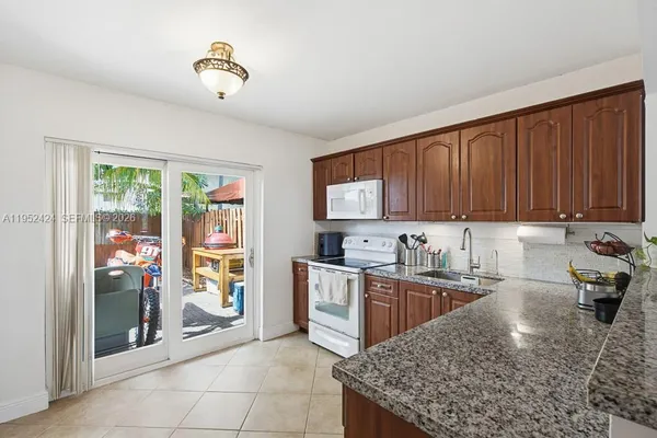 $334,900 | 560 Northwest 82nd Place, Unit 306, Miami, FL 33126