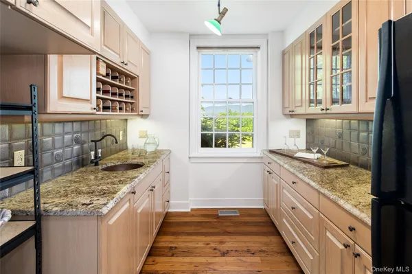 a kitchen with a stove and a sink