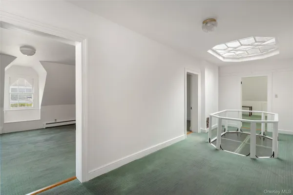 a view of a livingroom with furniture