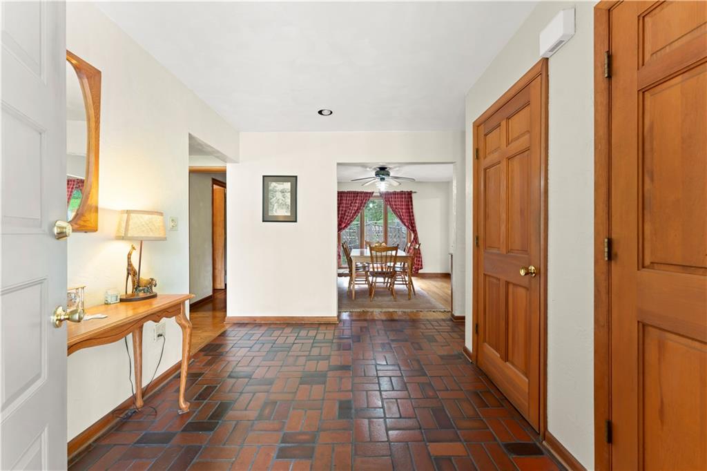 283 Sundust Road Eighty Four, PA 15330 - Photo 8 of 25 a hallway with dining table and chairs
