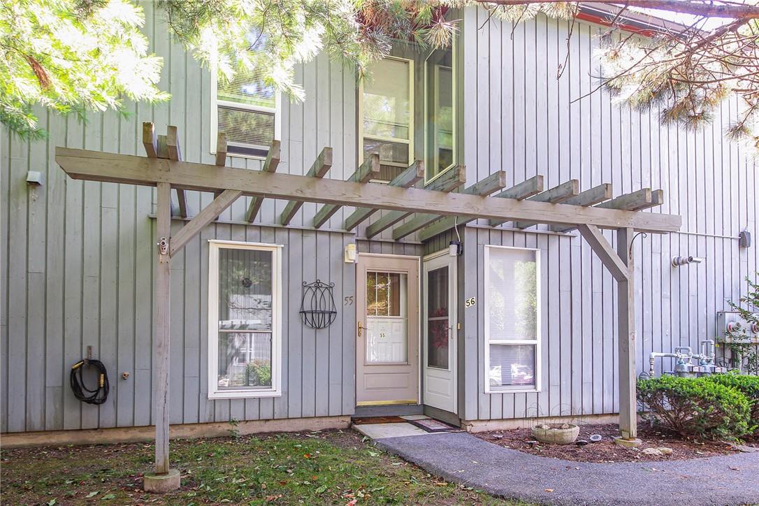 a front view of a house with a porch