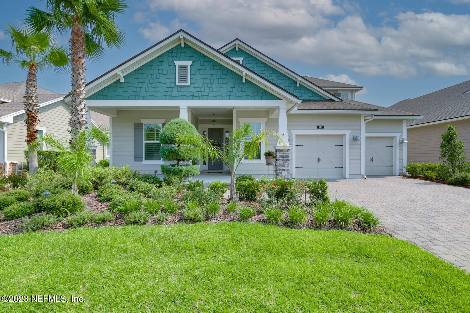 110 Pine Manor Drive Jacksonville, FL 32081 - Photo 1 of 55 a front view of a house with a garden and plants