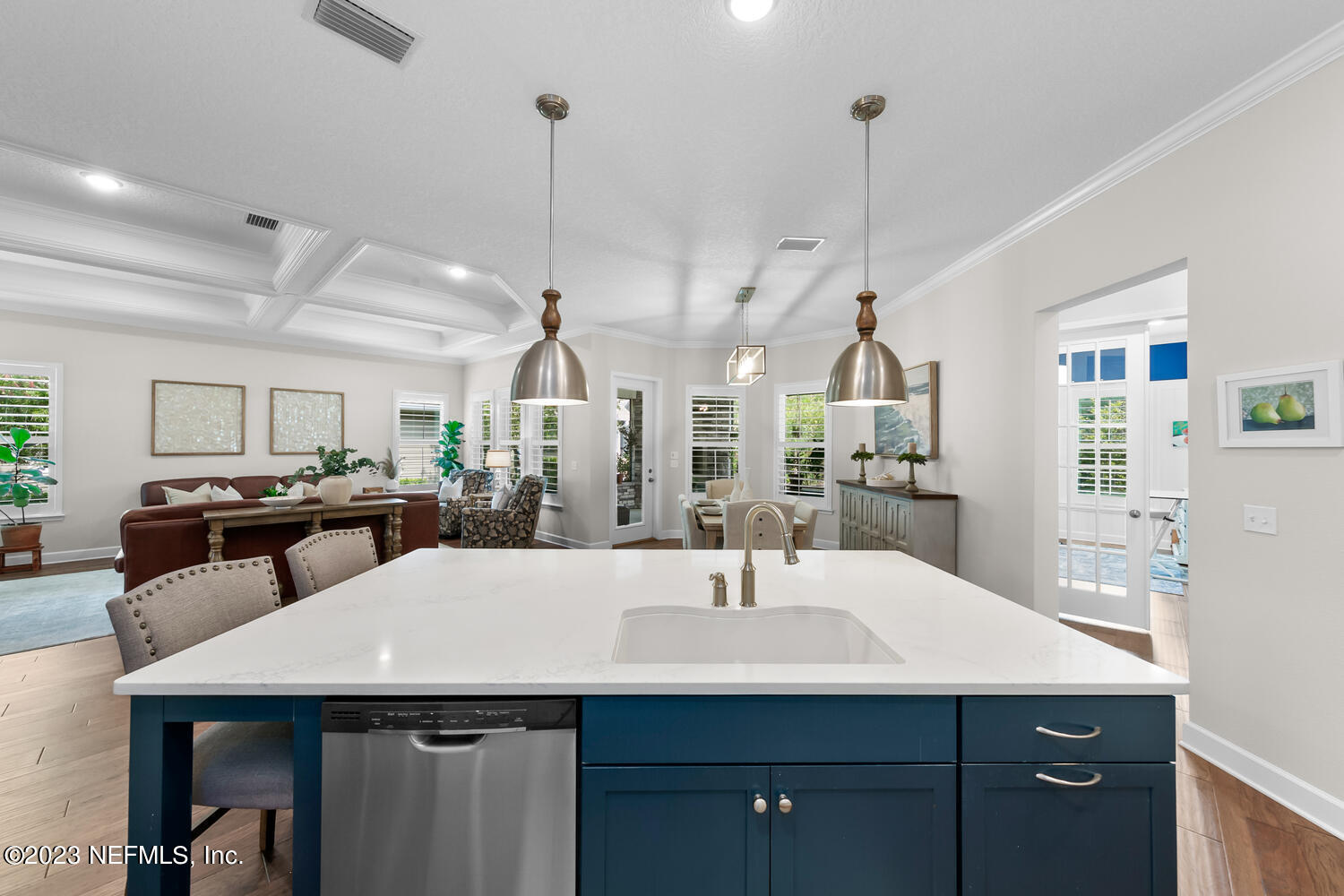 110 Pine Manor Drive Jacksonville, FL 32081 - Photo 11 of 55 a kitchen with a sink a island and chairs