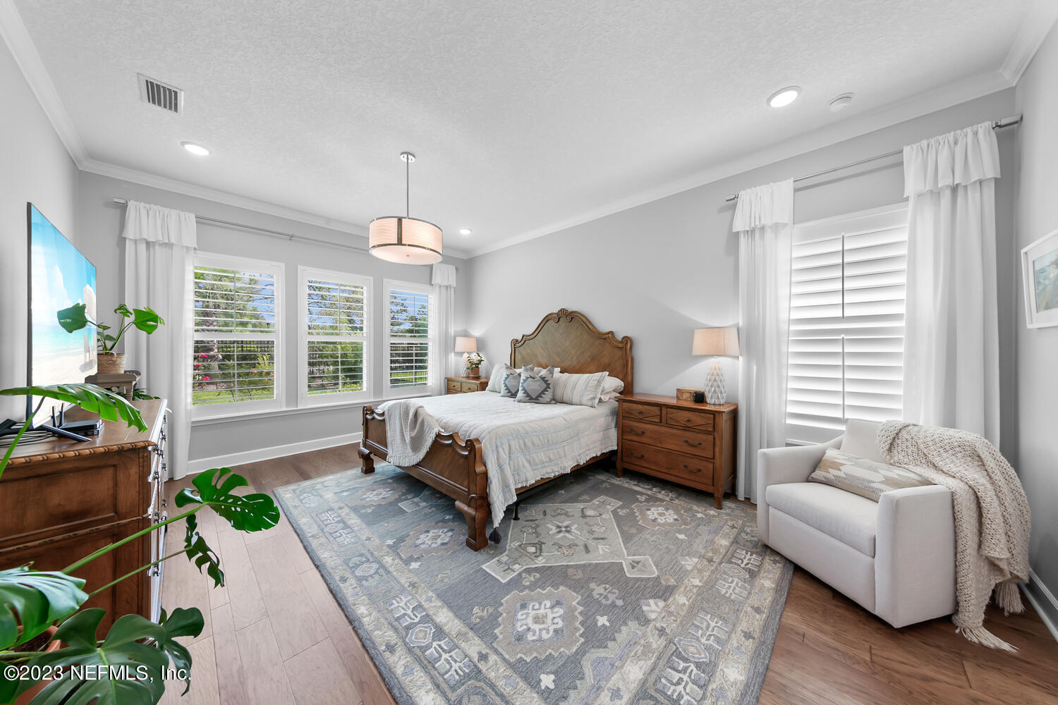 110 Pine Manor Drive Jacksonville, FL 32081 - Photo 20 of 55 a bed room with a bed and a couch