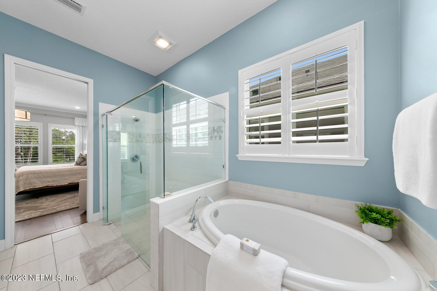 110 Pine Manor Drive Jacksonville, FL 32081 - Photo 23 of 55 a bathroom with a bathtub and a shower