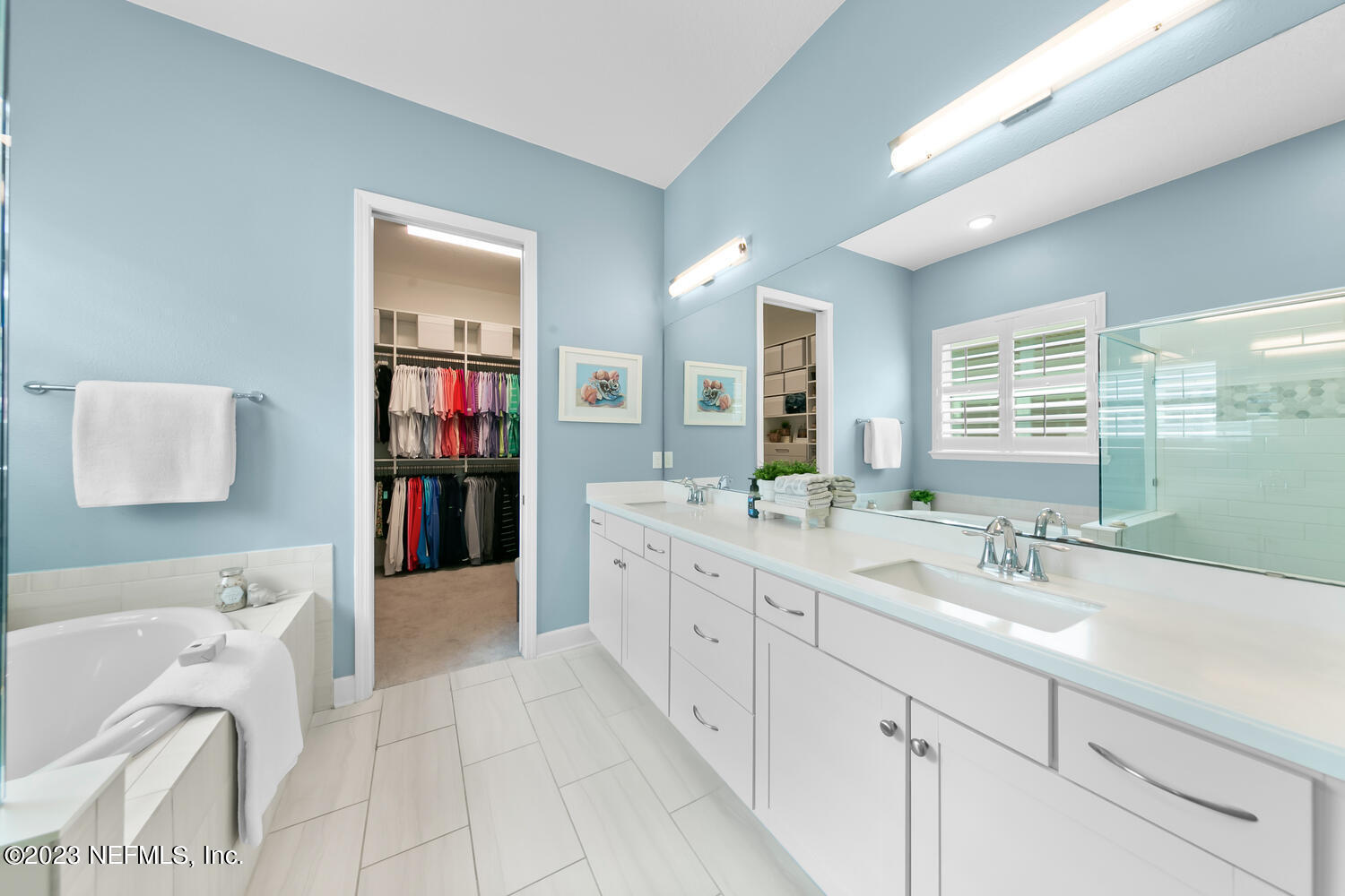 110 Pine Manor Drive Jacksonville, FL 32081 - Photo 24 of 55 a spacious bathroom with a sink double vanity granite tub shower and a mirror