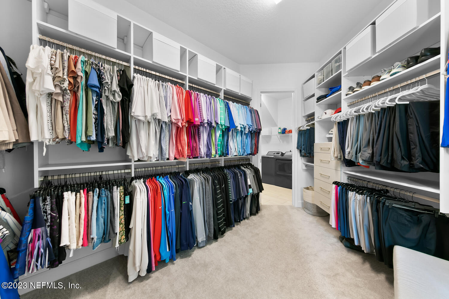 110 Pine Manor Drive Jacksonville, FL 32081 - Photo 25 of 55 a view of walk in closet with clothes and shoes