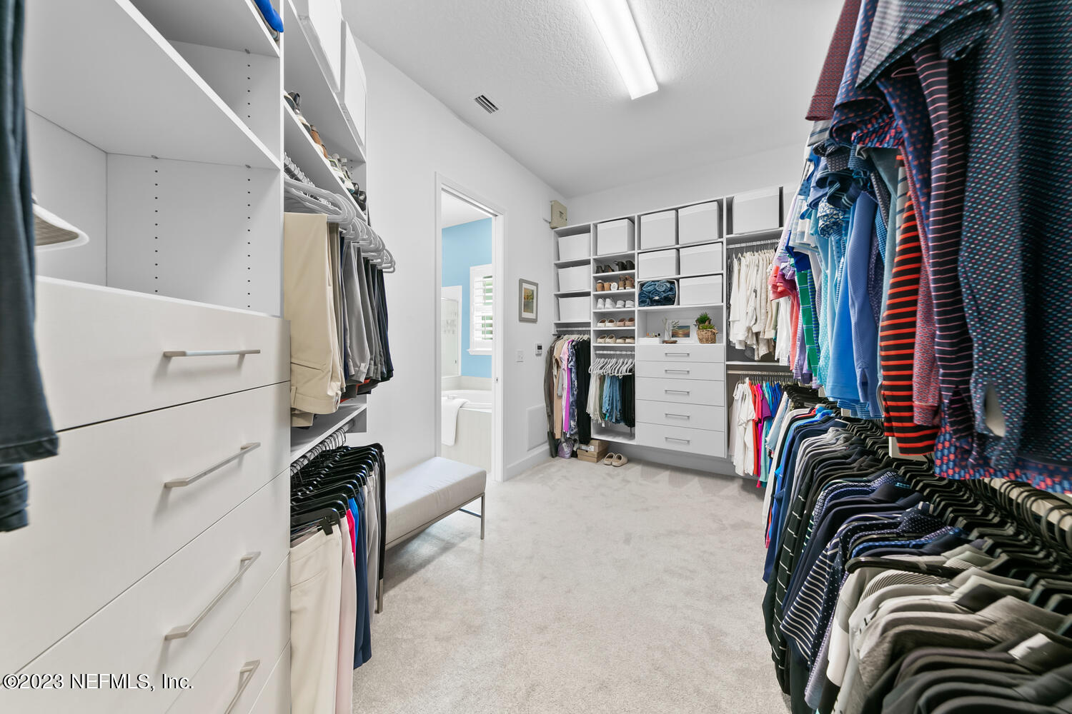 110 Pine Manor Drive Jacksonville, FL 32081 - Photo 26 of 55 a view of walk in closet with clothes