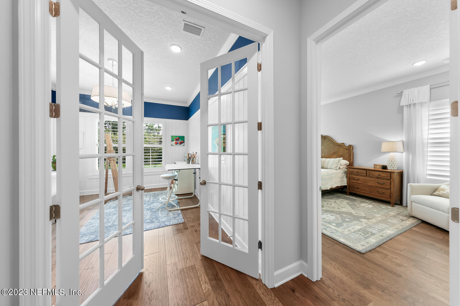 110 Pine Manor Drive Jacksonville, FL 32081 - Photo 27 of 55 a view of living room and entryway with wooden floor