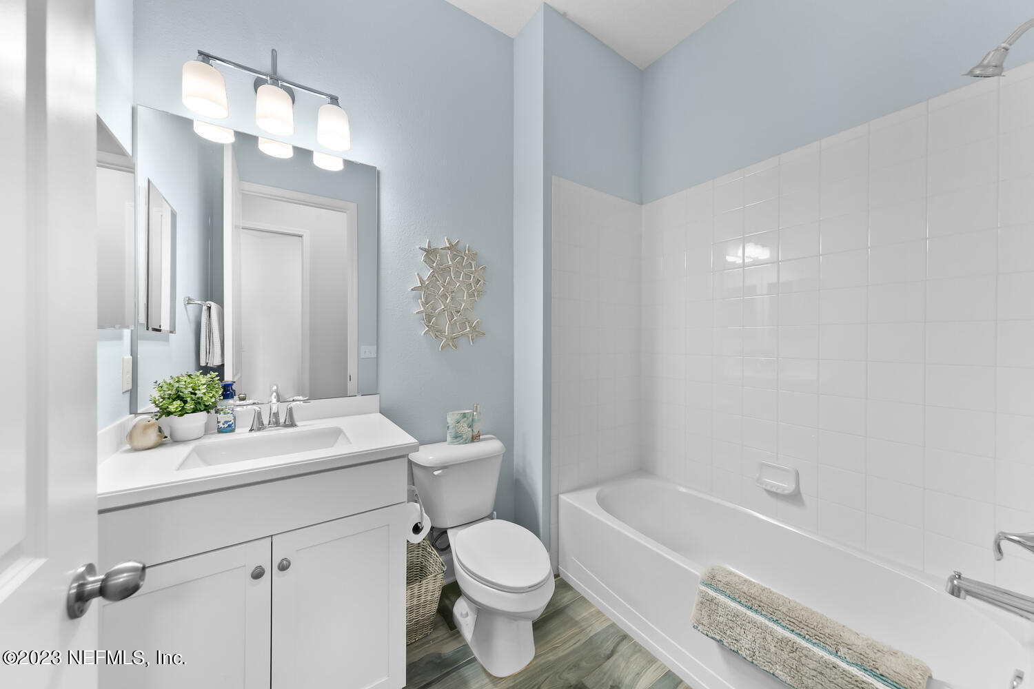 110 Pine Manor Drive Jacksonville, FL 32081 - Photo 41 of 55 a bathroom with a sink a toilet a mirror and shower