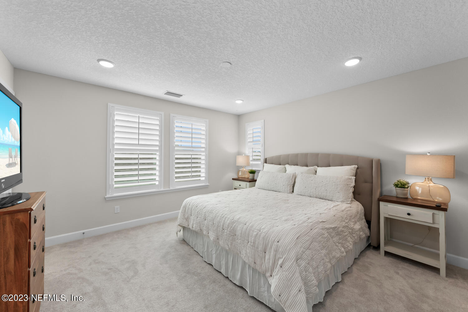 110 Pine Manor Drive Jacksonville, FL 32081 - Photo 42 of 55 a bedroom with a bed and a window