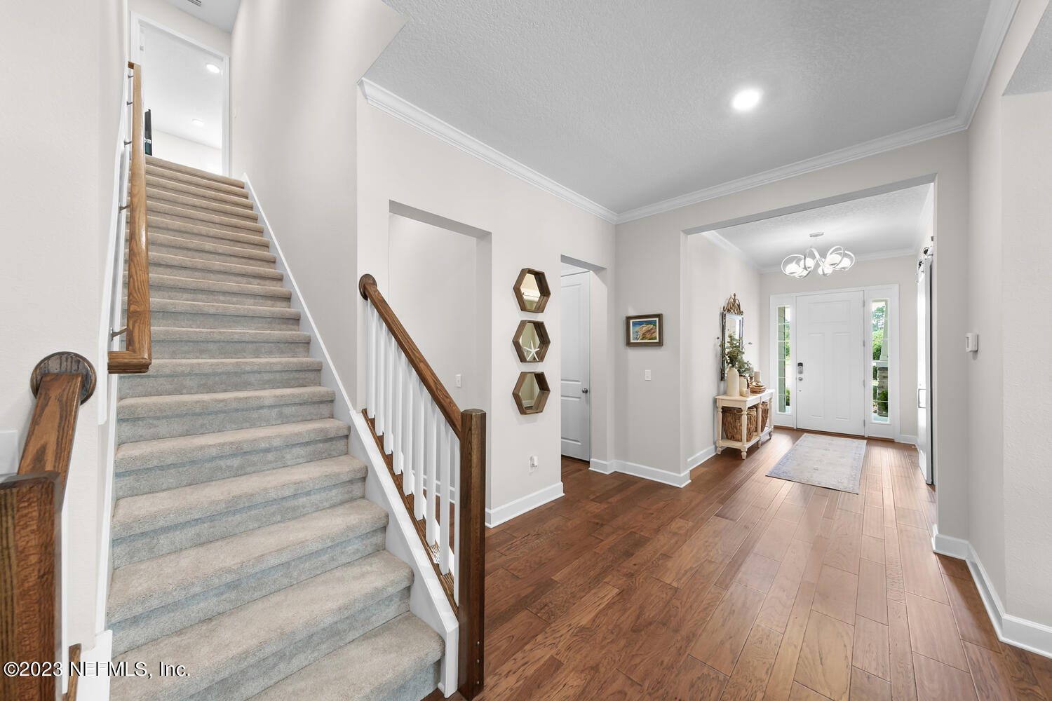 110 Pine Manor Drive Jacksonville, FL 32081 - Photo 6 of 55 a view of a hallway with wooden floor and entryway
