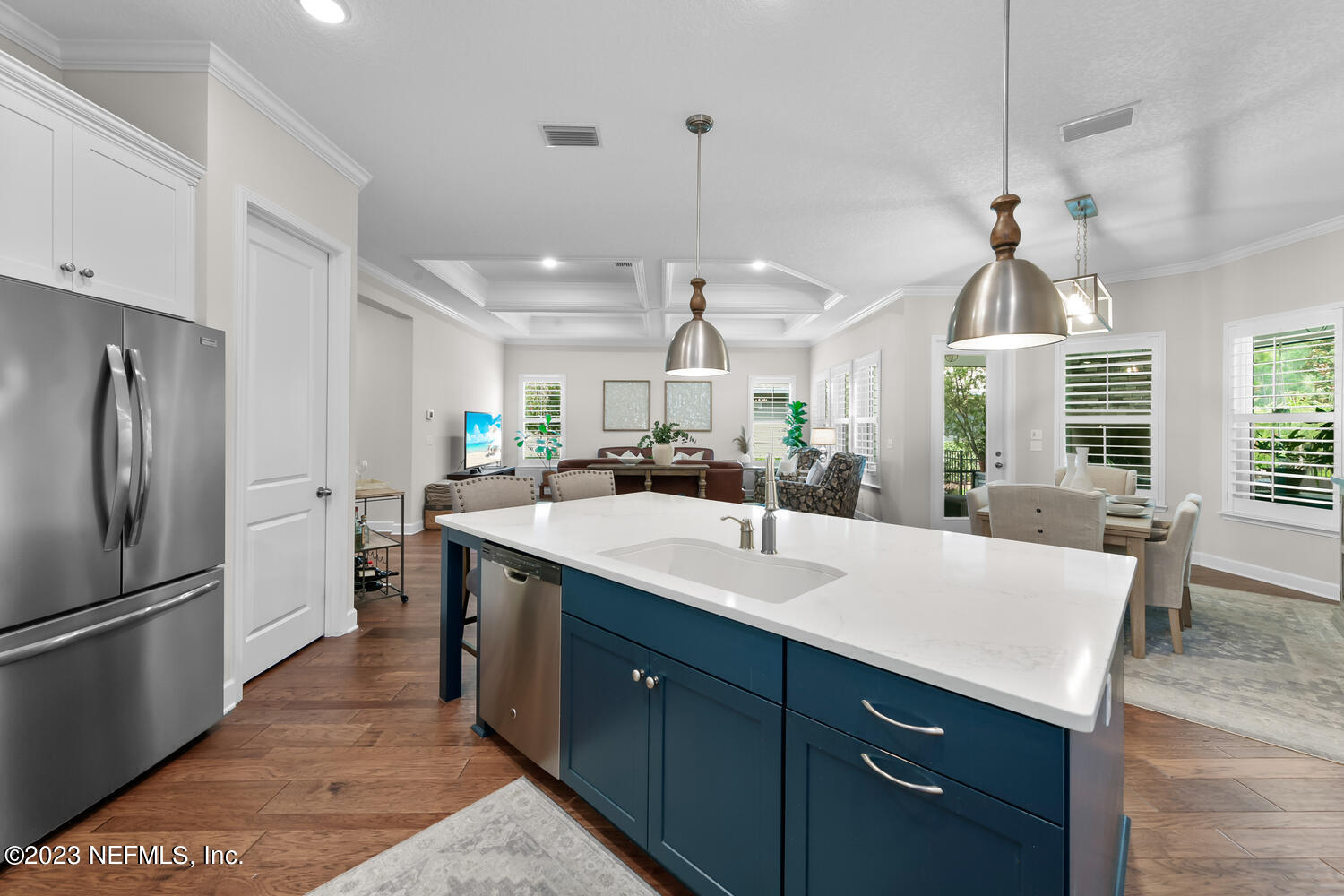 110 Pine Manor Drive Jacksonville, FL 32081 - Photo 10 of 55 a kitchen with granite countertop a refrigerator a sink dishwasher a oven and a dining table with wooden floor