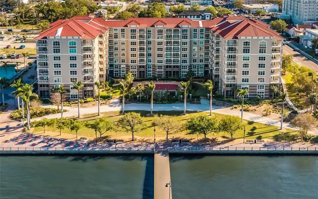 a view of a swimming pool with a lounge chairs